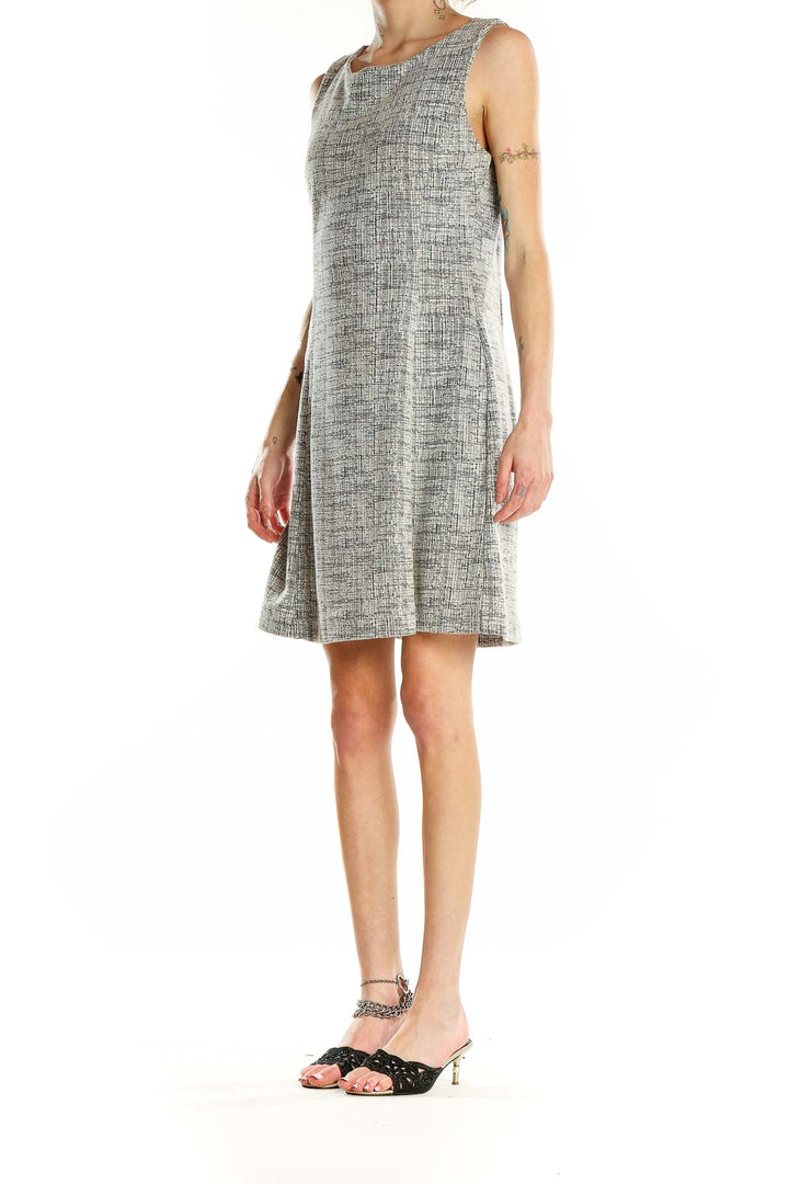 Front view of Tahari gray textured sleeveless sheath dress