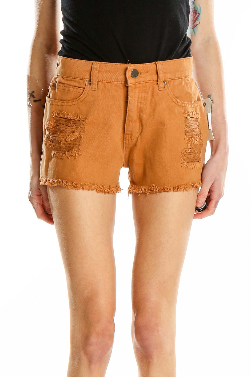 Front view of orange distressed Billabong cotton shorts