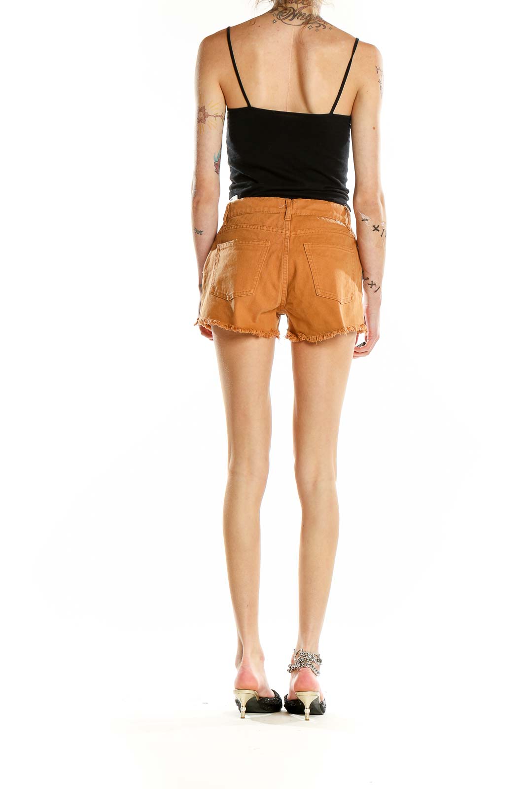 Back view of orange distressed Billabong cotton shorts
