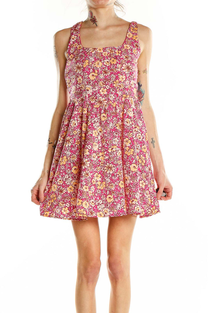 Front view of Band of the Free pink floral mini dress with square neckline