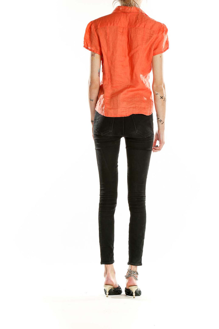Back view of Rafaella orange linen short-sleeve button-up shirt