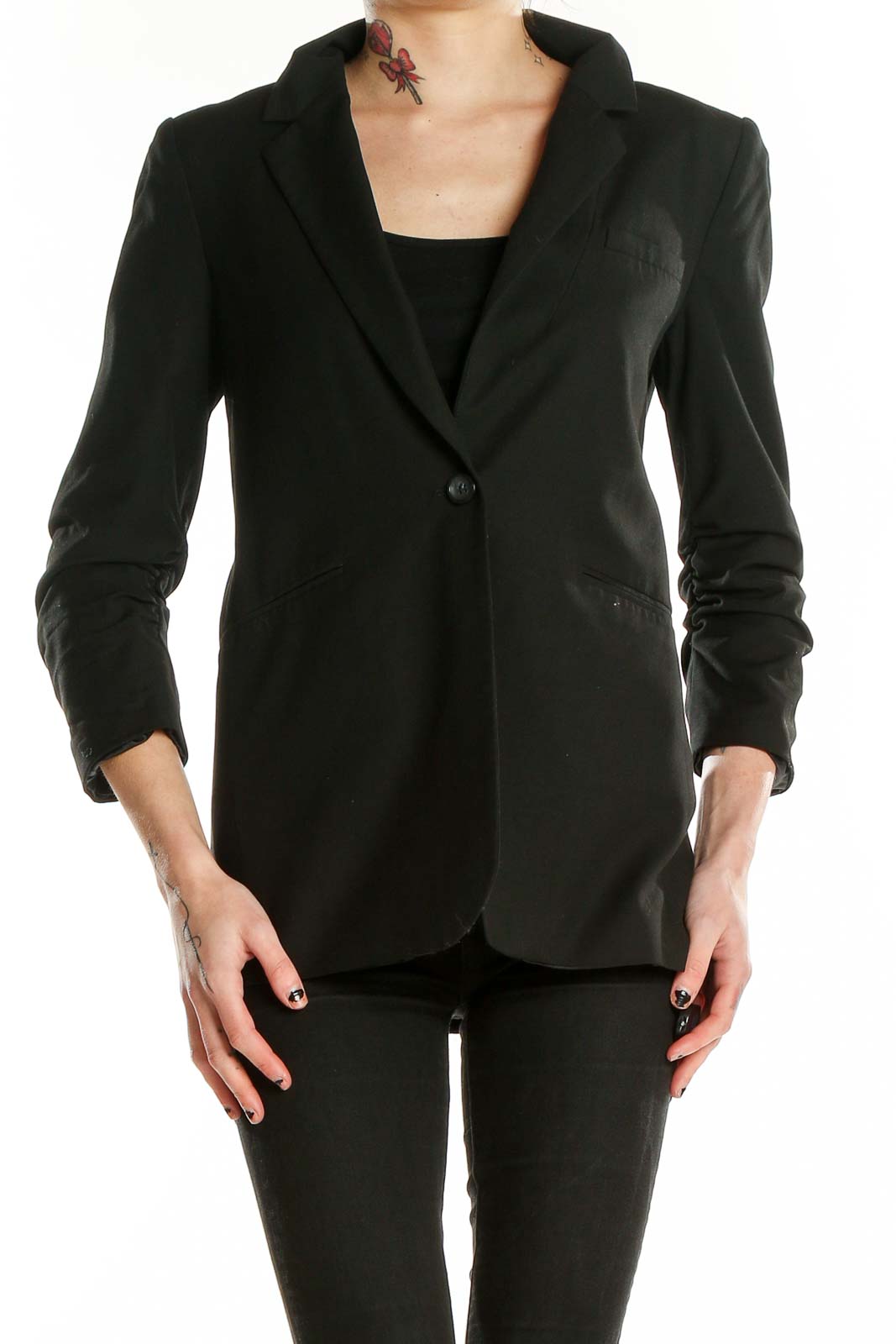 Front view of Elizabeth and James black blazer with single button closure