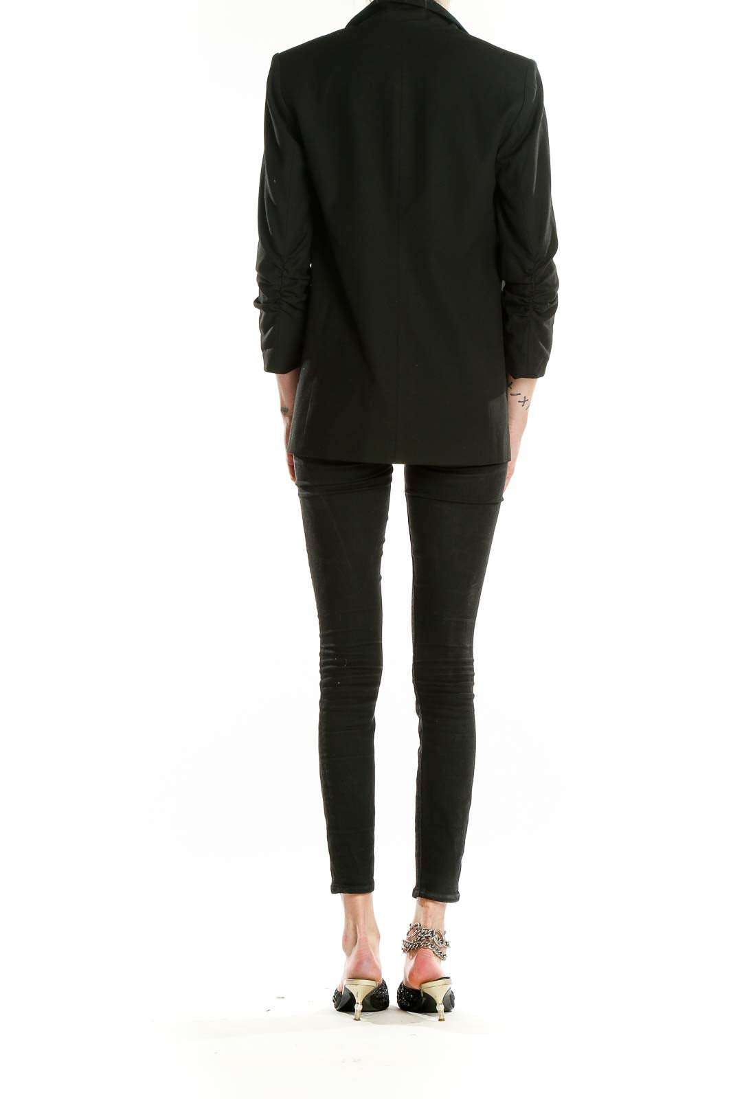 Back view of Elizabeth and James black blazer showing tailored fit