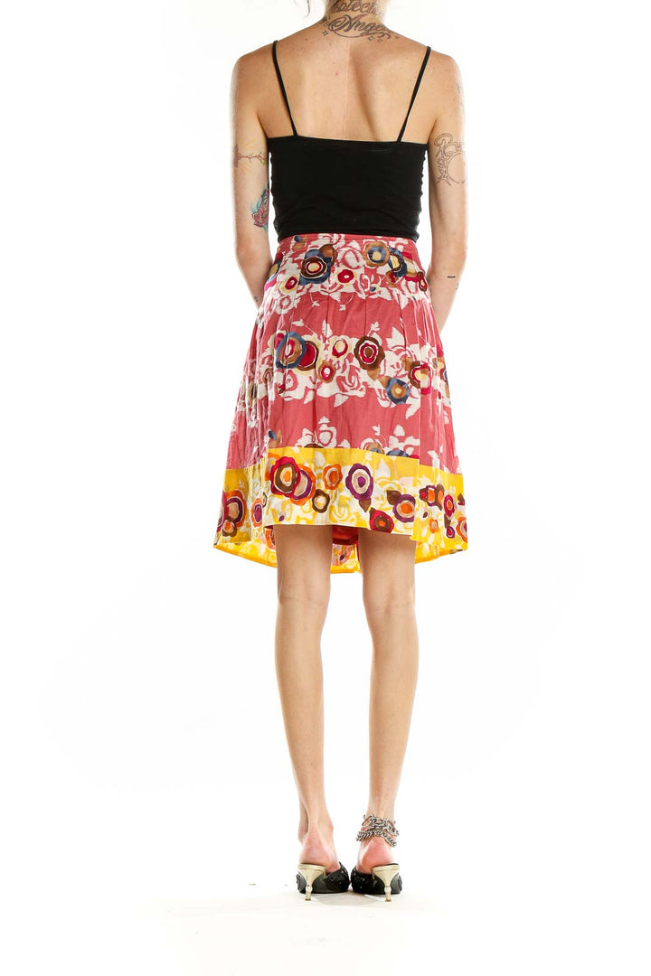 Back view of BCBG MaxAzria pink floral circle print pleated skirt