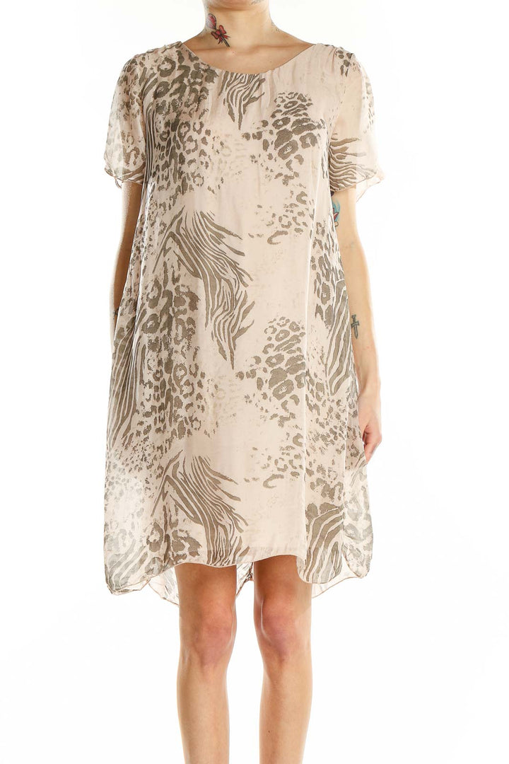 Front view of Elena Baldi beige animal print silk blend shift dress