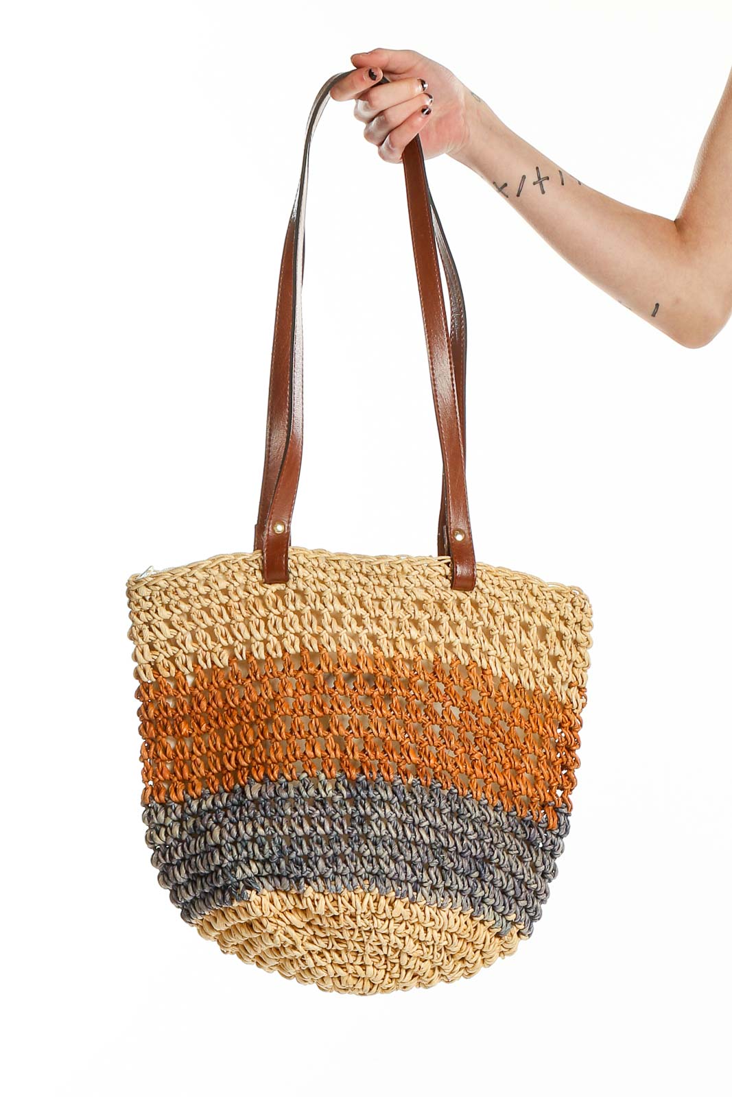 Front view of Bruno Lorelli multicolor striped straw tote bag with leather handles