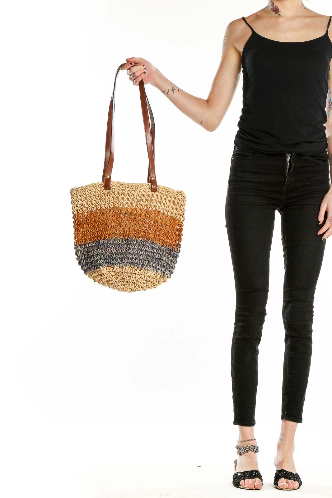 Front view of Bruno Lorelli multicolor striped straw tote bag with leather handles