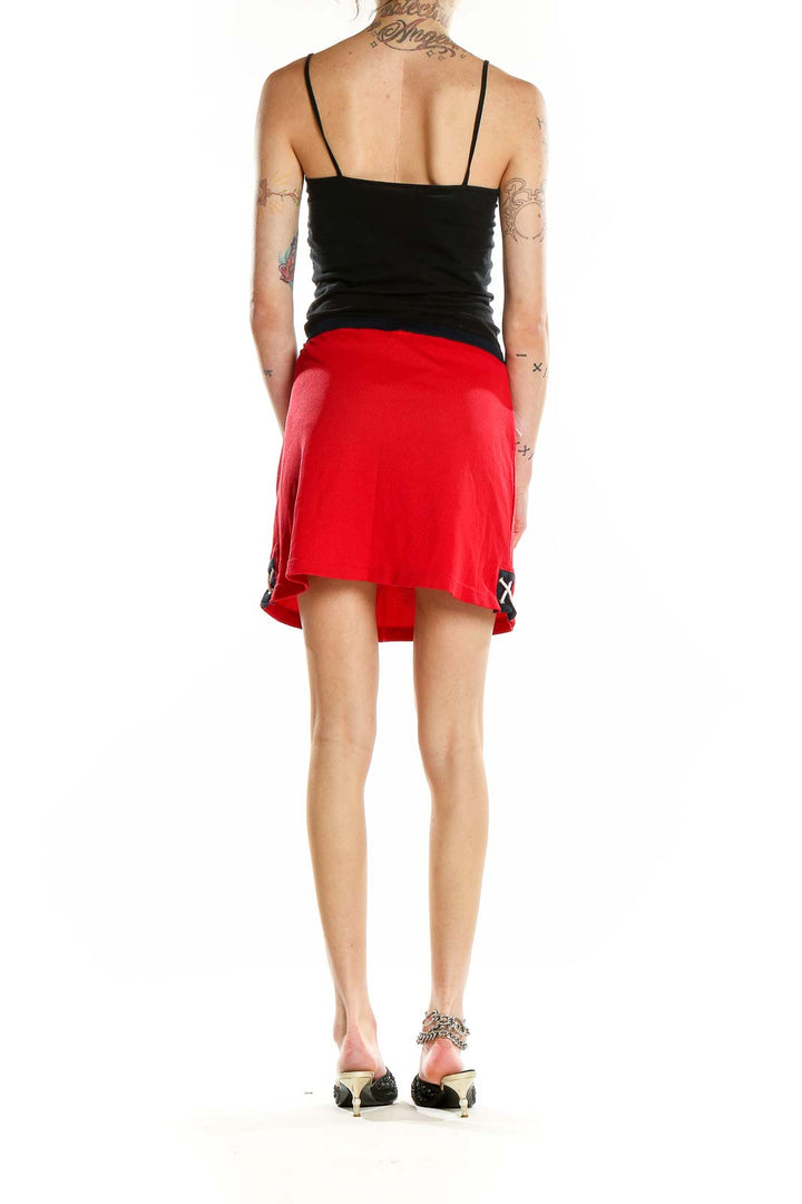 Back view of red Tail athletic skort showing length and fit
