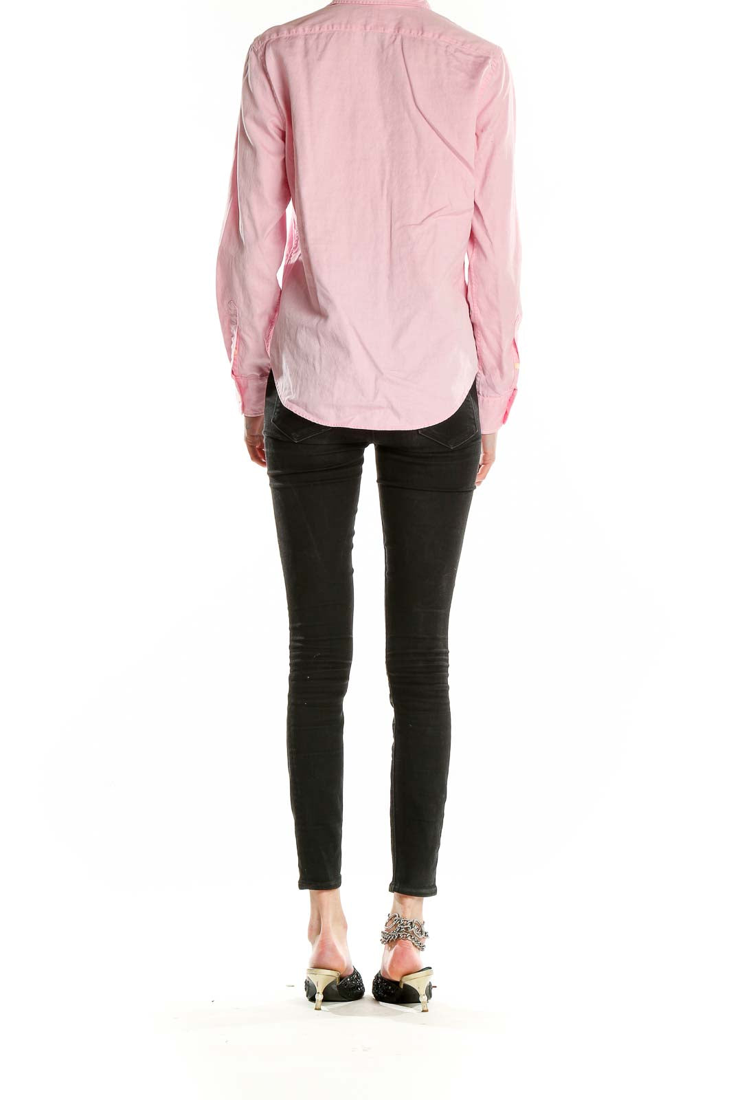Back view of pink Ralph Lauren Golf cotton button-down shirt on model with black pants