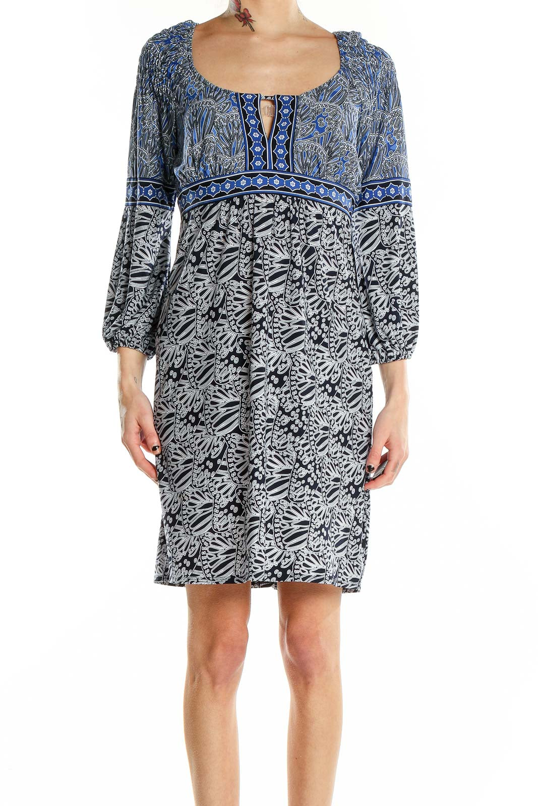 Front view of LAUNDRY by SHELLI SEGAL blue and black floral print empire waist dress