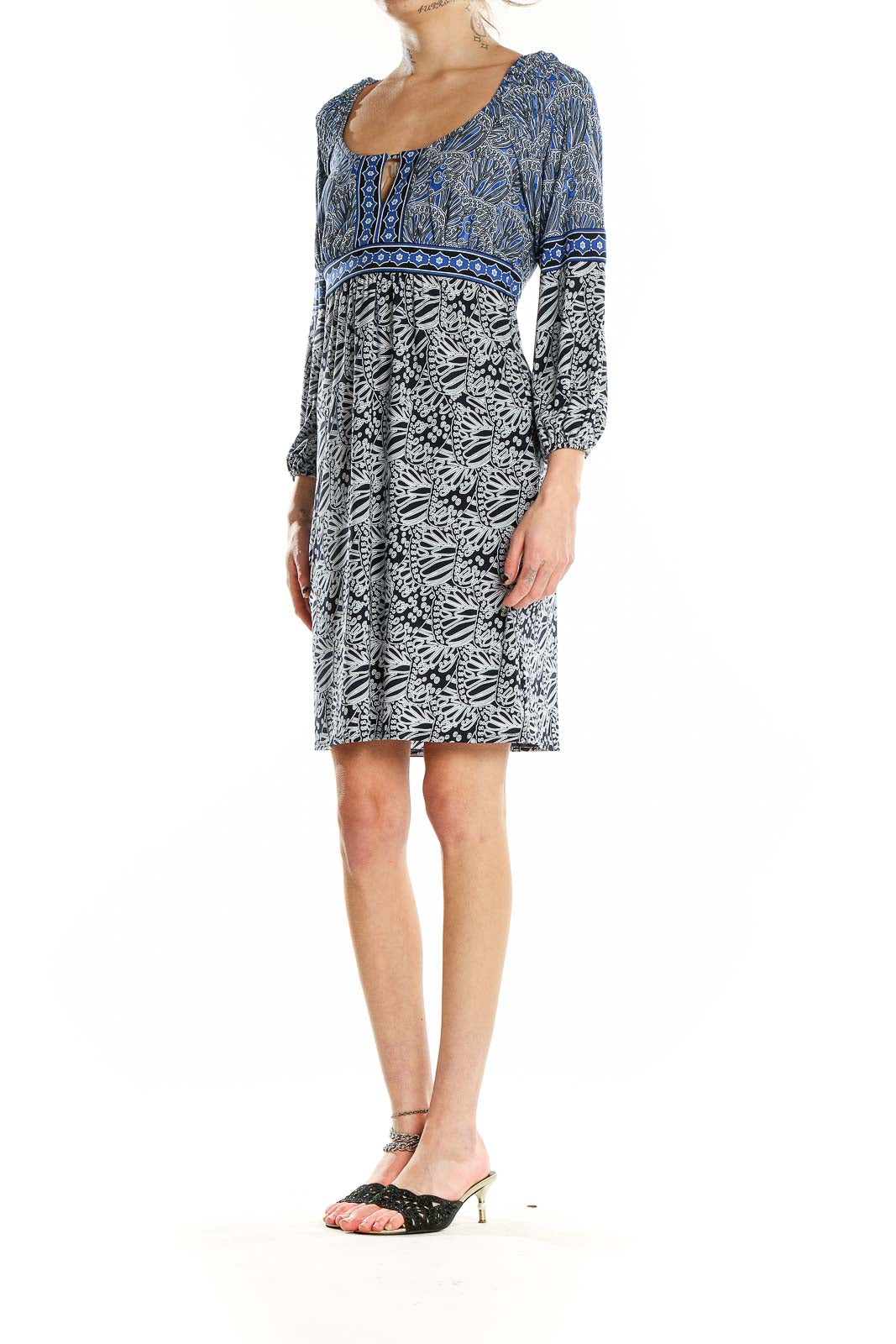 Front view of LAUNDRY by SHELLI SEGAL blue and black floral print empire waist dress