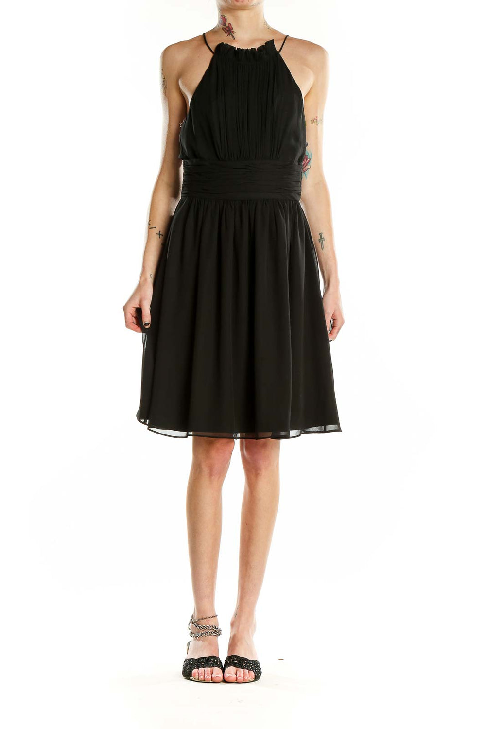 Front view of black halter neck cocktail dress from White House Black Market