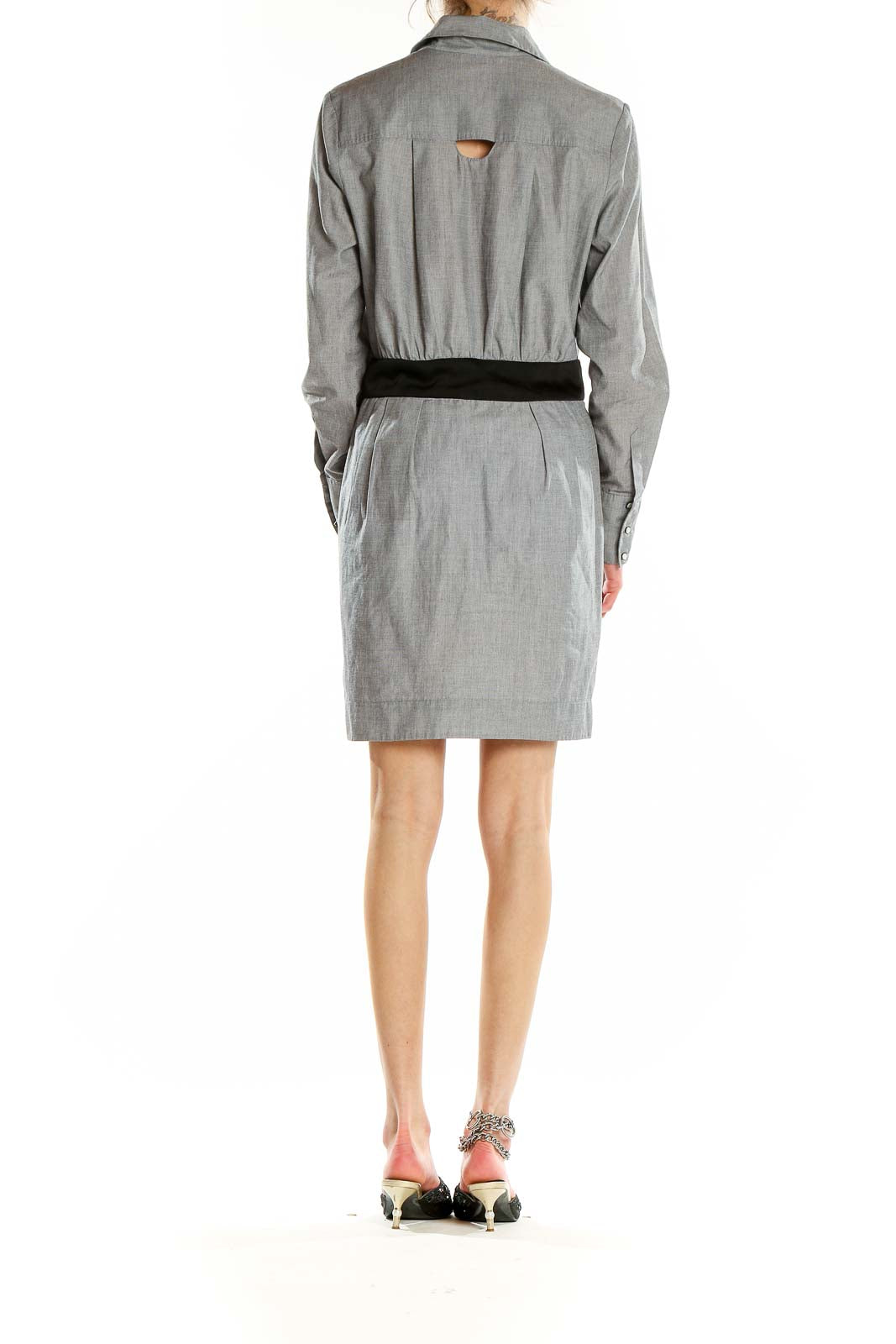 Back view of gray BCBGeneration shirt dress showing cutout detail