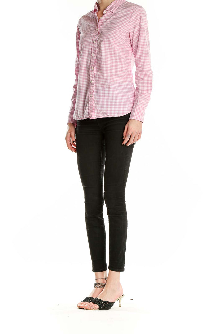 Front view of J.Crew pink gingham check cotton button-up shirt on model