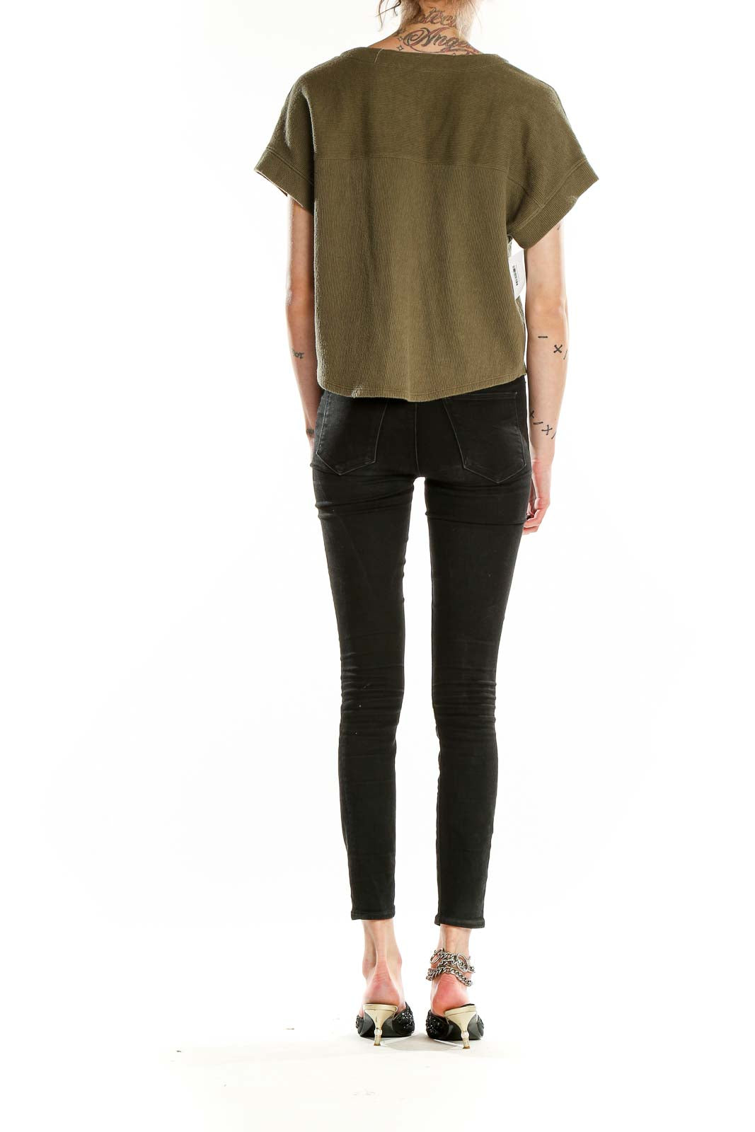 Back view of Madewell olive V-neck cotton top on model with black jeans
