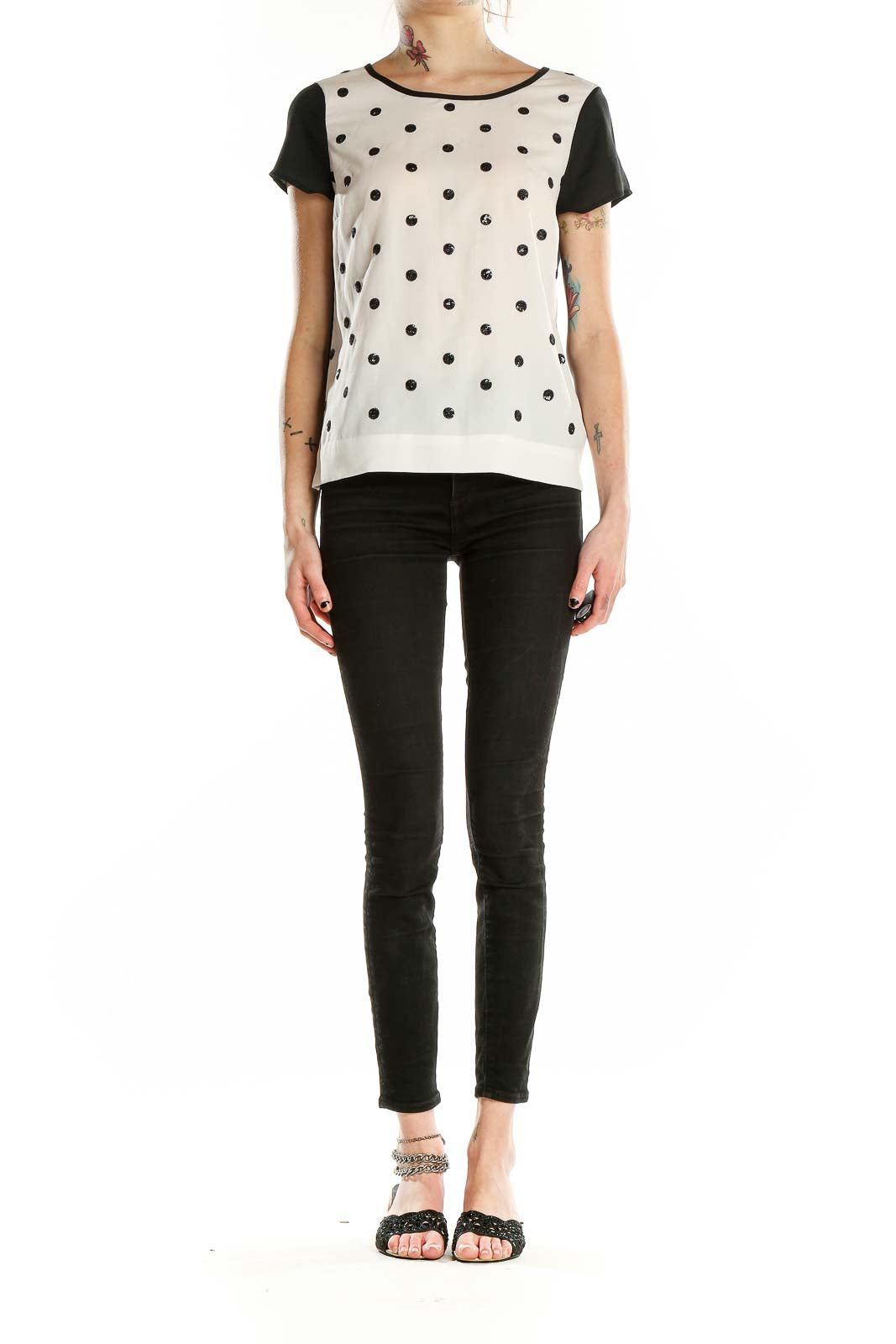 Front view of Coldwater Creek white top with black polka dots and contrasting black sleeves