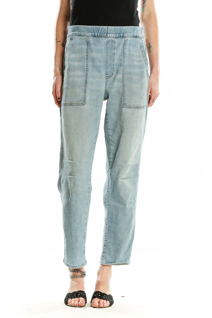 Front view of Madewell light blue relaxed fit denim jeans with patch pockets