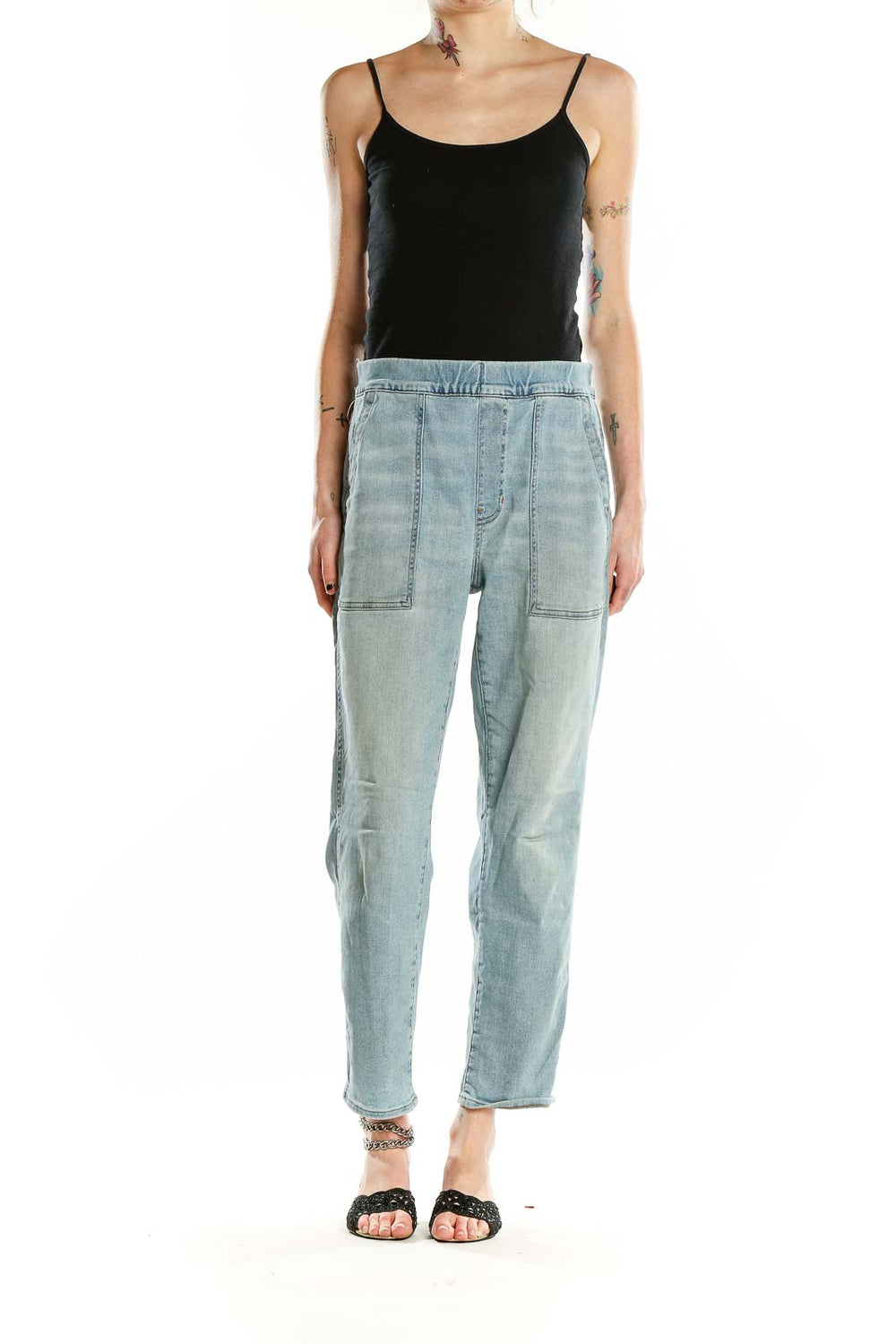 Front view of Madewell light blue relaxed fit denim jeans with patch pockets