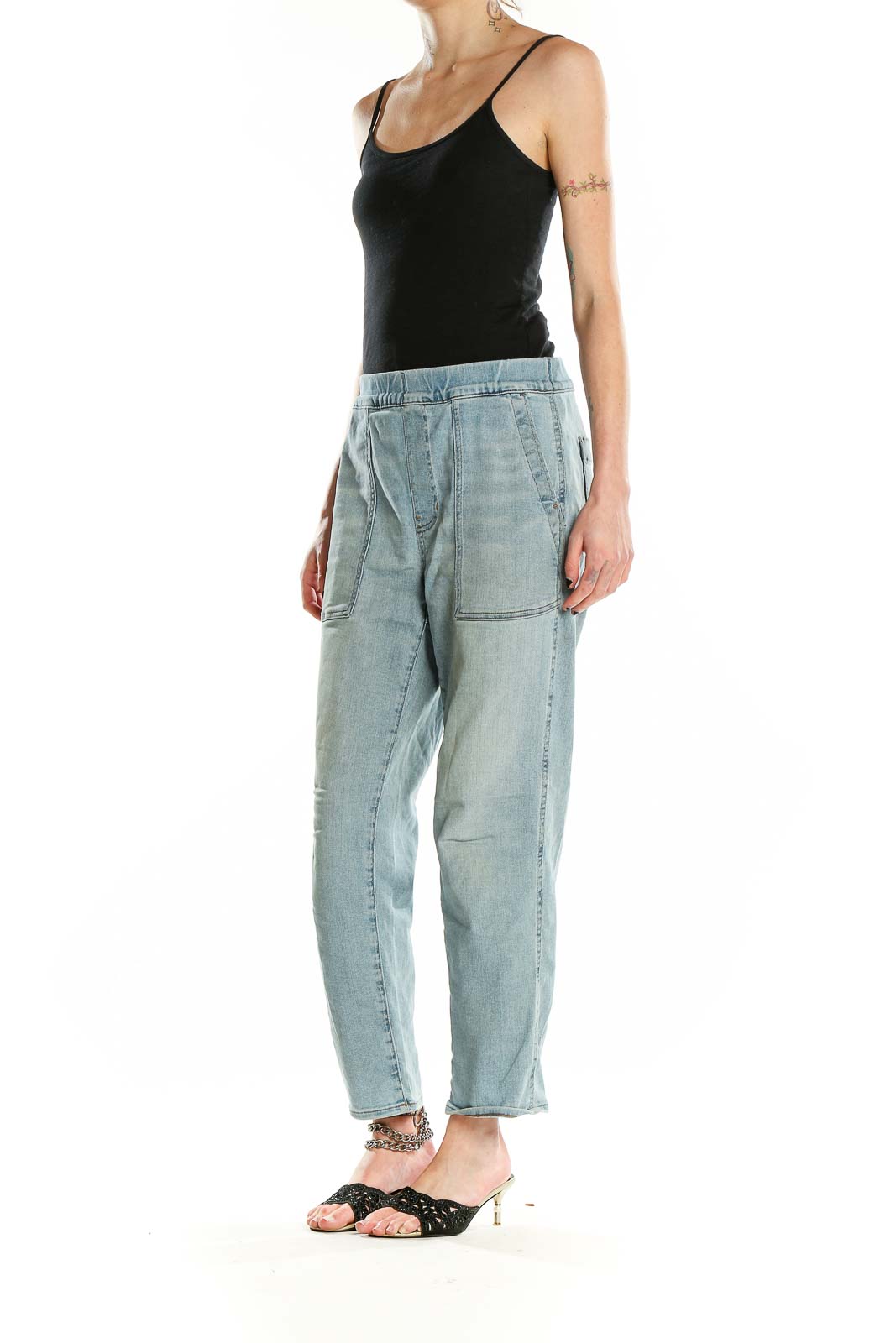 Front view of Madewell light blue relaxed fit denim jeans with patch pockets
