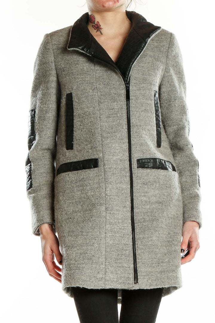 Front view of Vince Camuto gray wool blend coat with black trim and zip-up closure