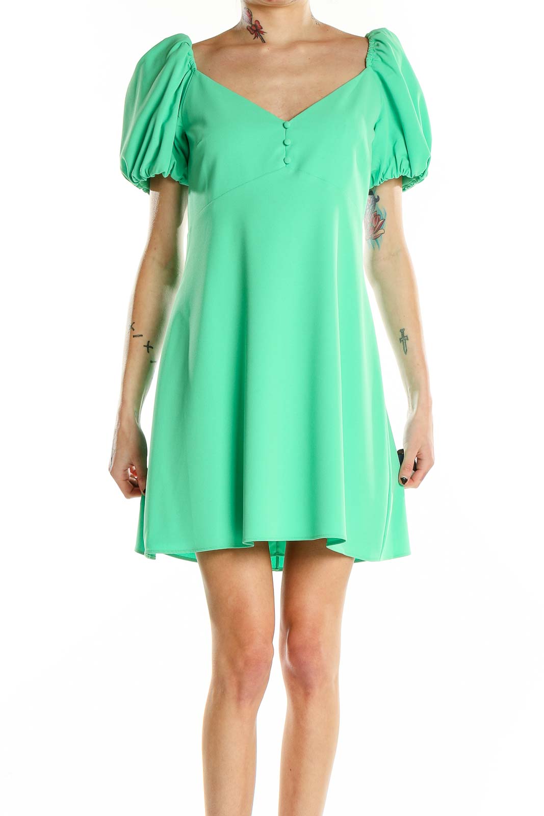 Front view of green puff sleeve mini dress by Alice + Olivia
