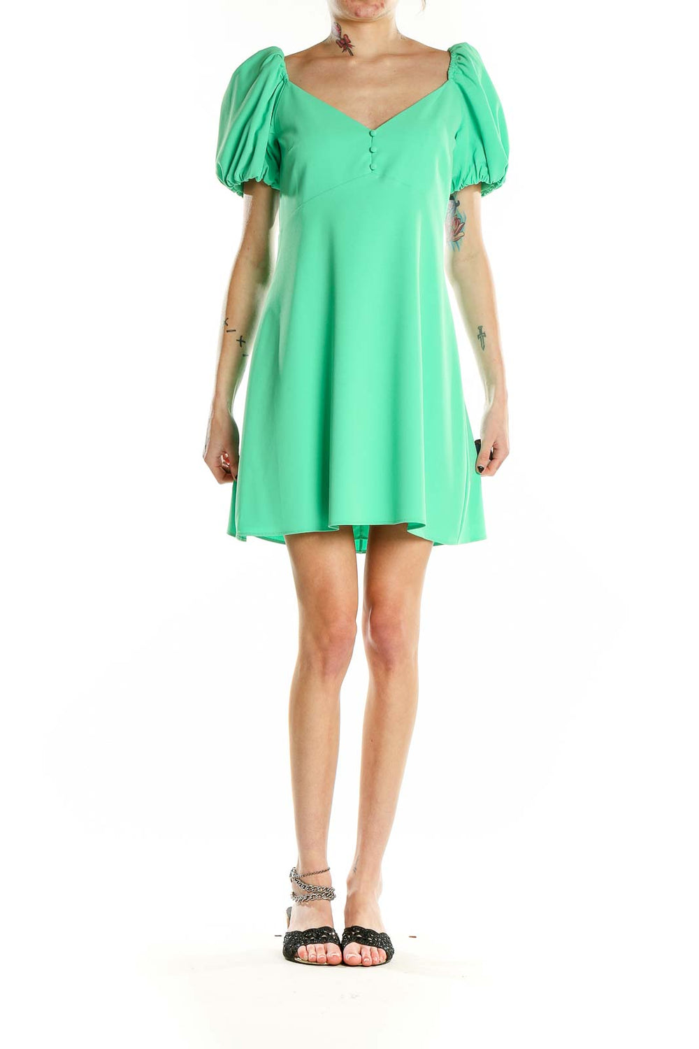 Front view of green puff sleeve mini dress by Alice + Olivia