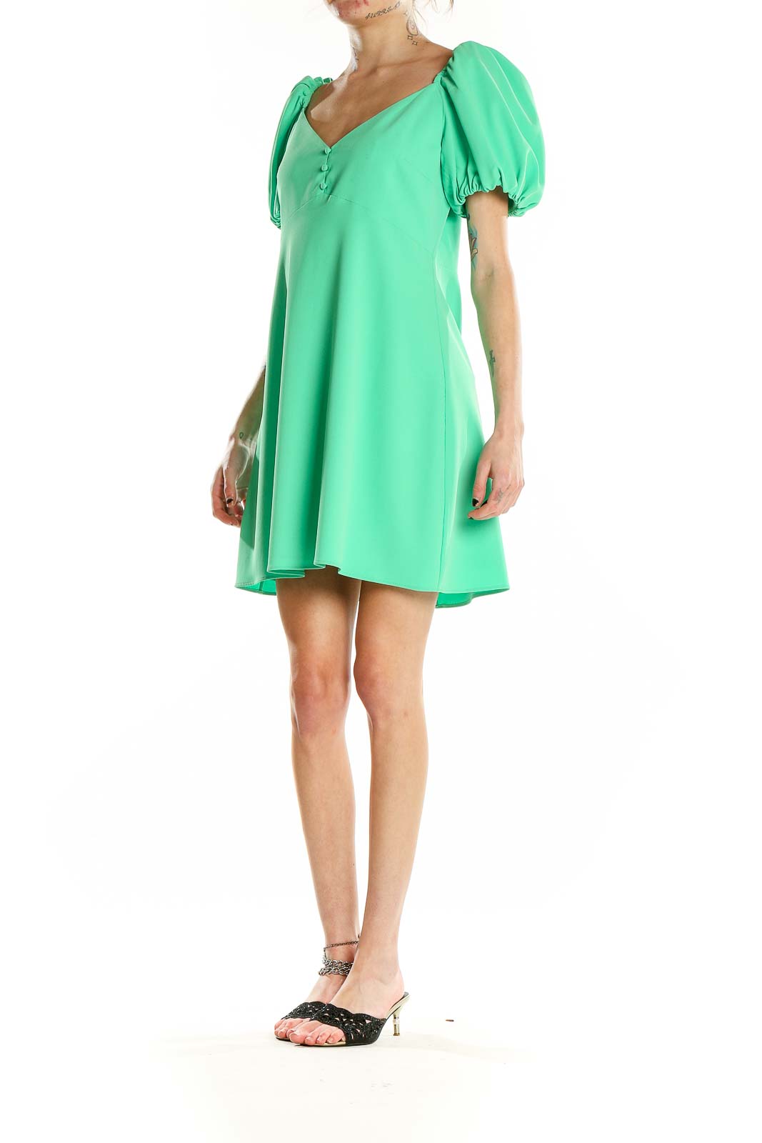 Front view of green puff sleeve mini dress by Alice + Olivia