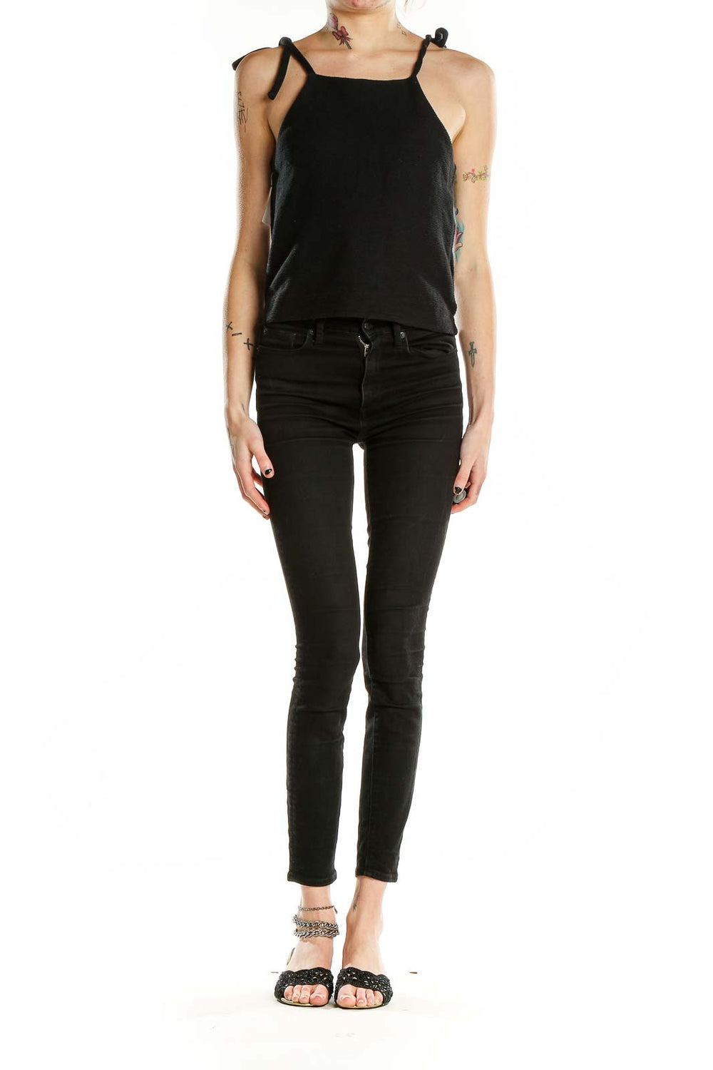 Front view of Madewell black cotton cropped tank top with tie straps