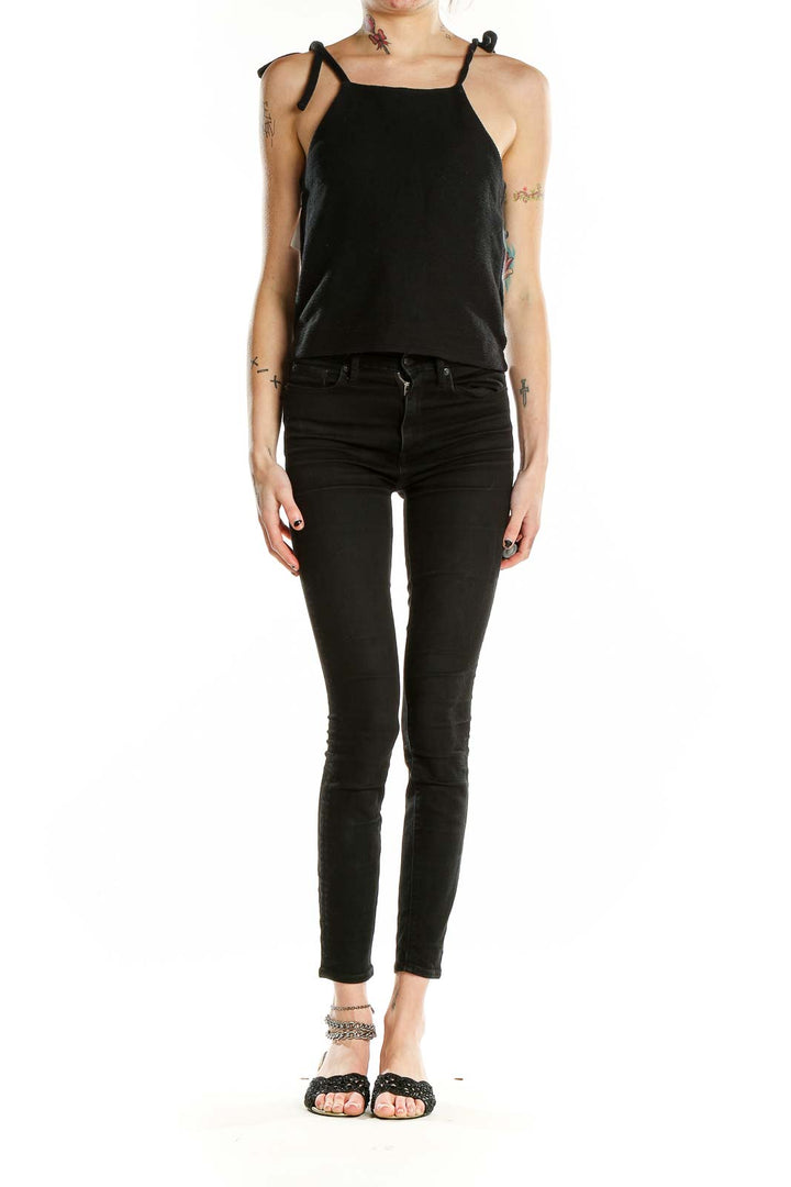 Front view of Madewell black cotton cropped tank top with tie straps