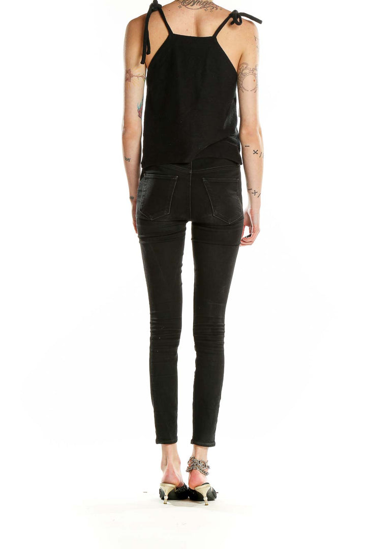 Back view of Madewell black cotton cropped tank top with tie straps
