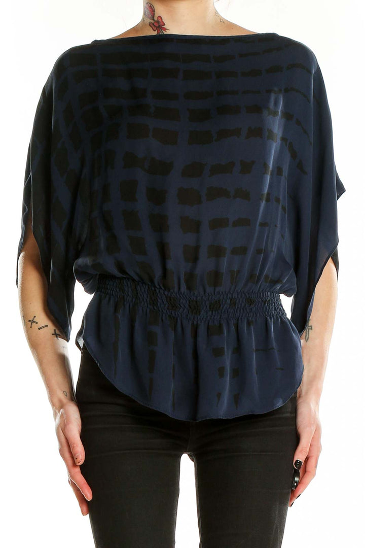 Front view of Parker navy silk blouse with geometric print and dolman sleeves