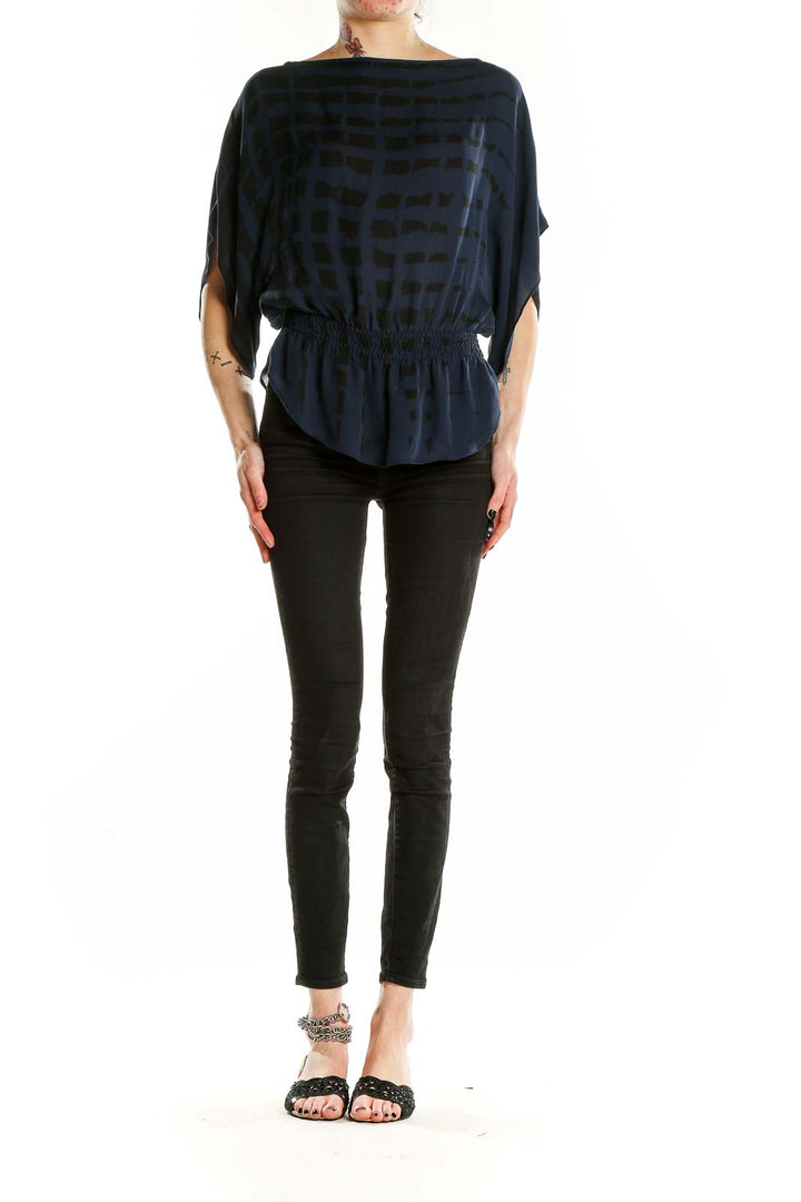 Front view of Parker navy silk blouse with geometric print and dolman sleeves