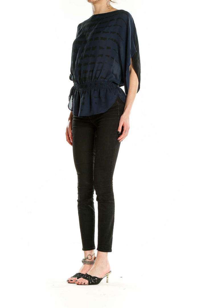 Front view of Parker navy silk blouse with geometric print and dolman sleeves