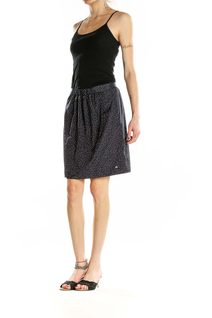 Front view of Tommy Hilfiger navy polka dot A-line skirt