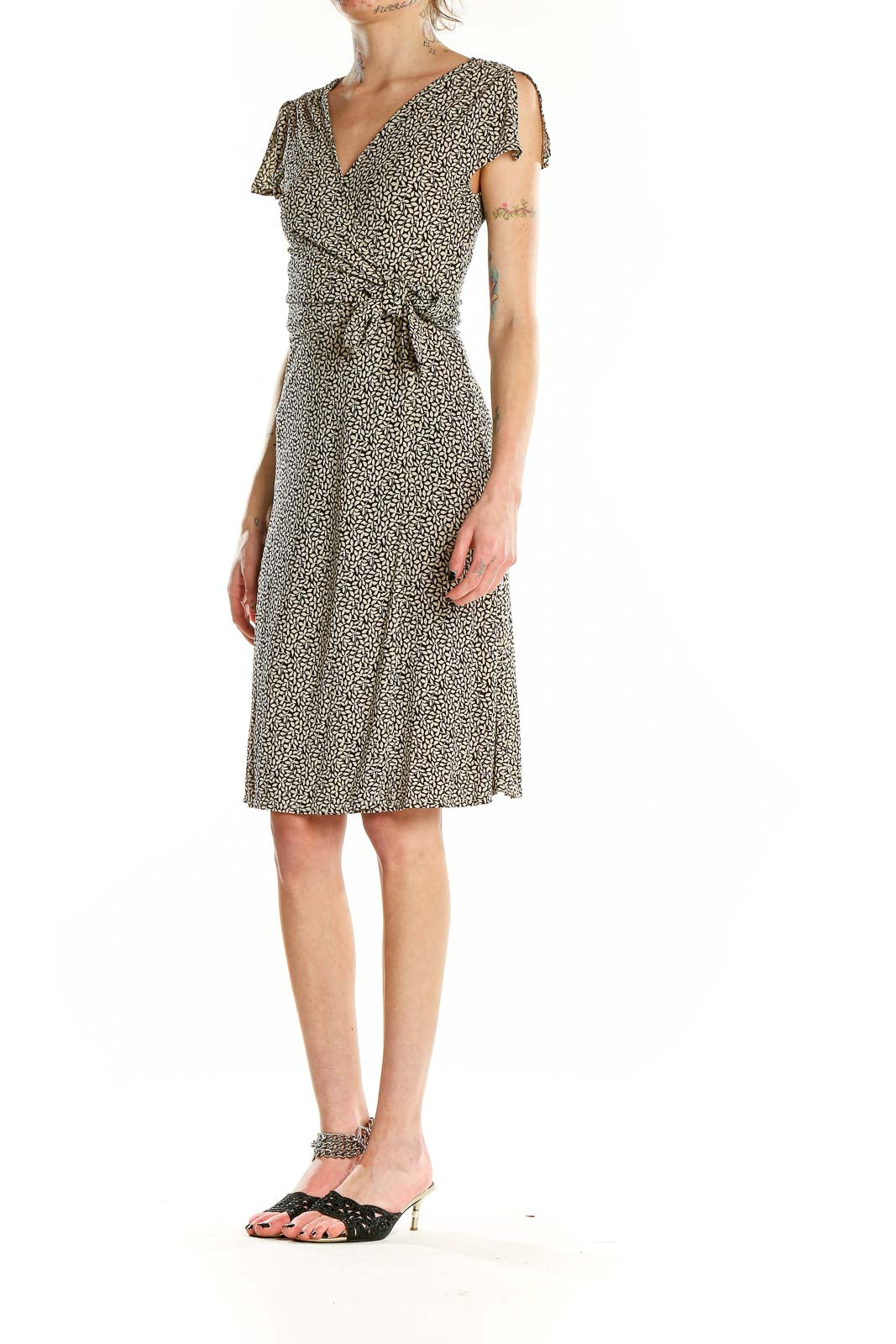Front view of Ann Taylor black floral wrap midi dress with V-neckline and short sleeves