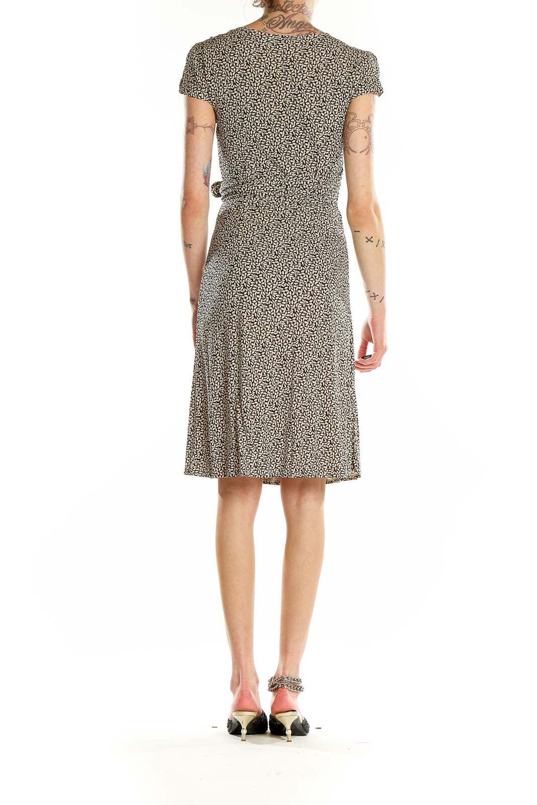 Back view of Ann Taylor black floral wrap midi dress showing full-length silhouette
