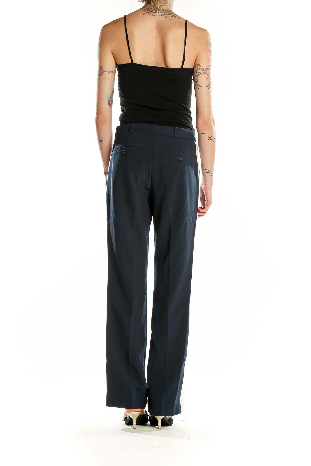 Back view of Banana Republic navy wide-leg dress pants showing rear welt pockets