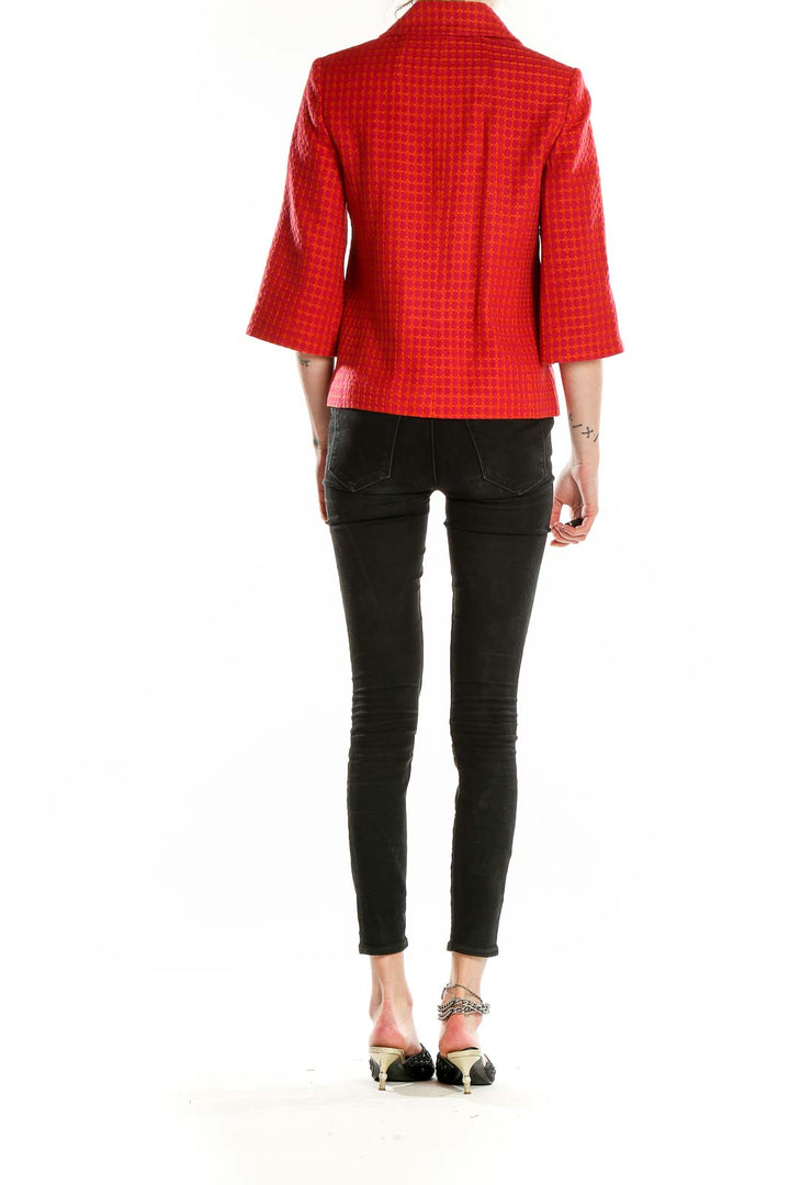 Back view of red textured cropped jacket from Banana Republic