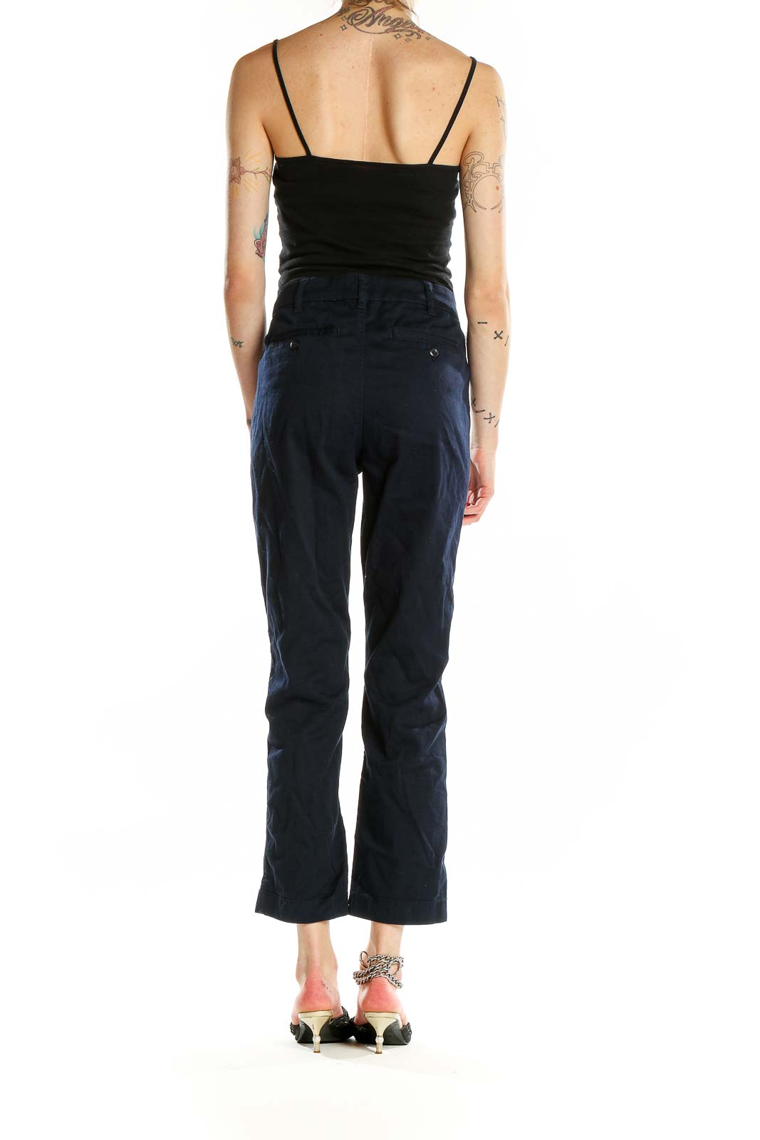 Back view of J.Crew navy cropped chino pants on model