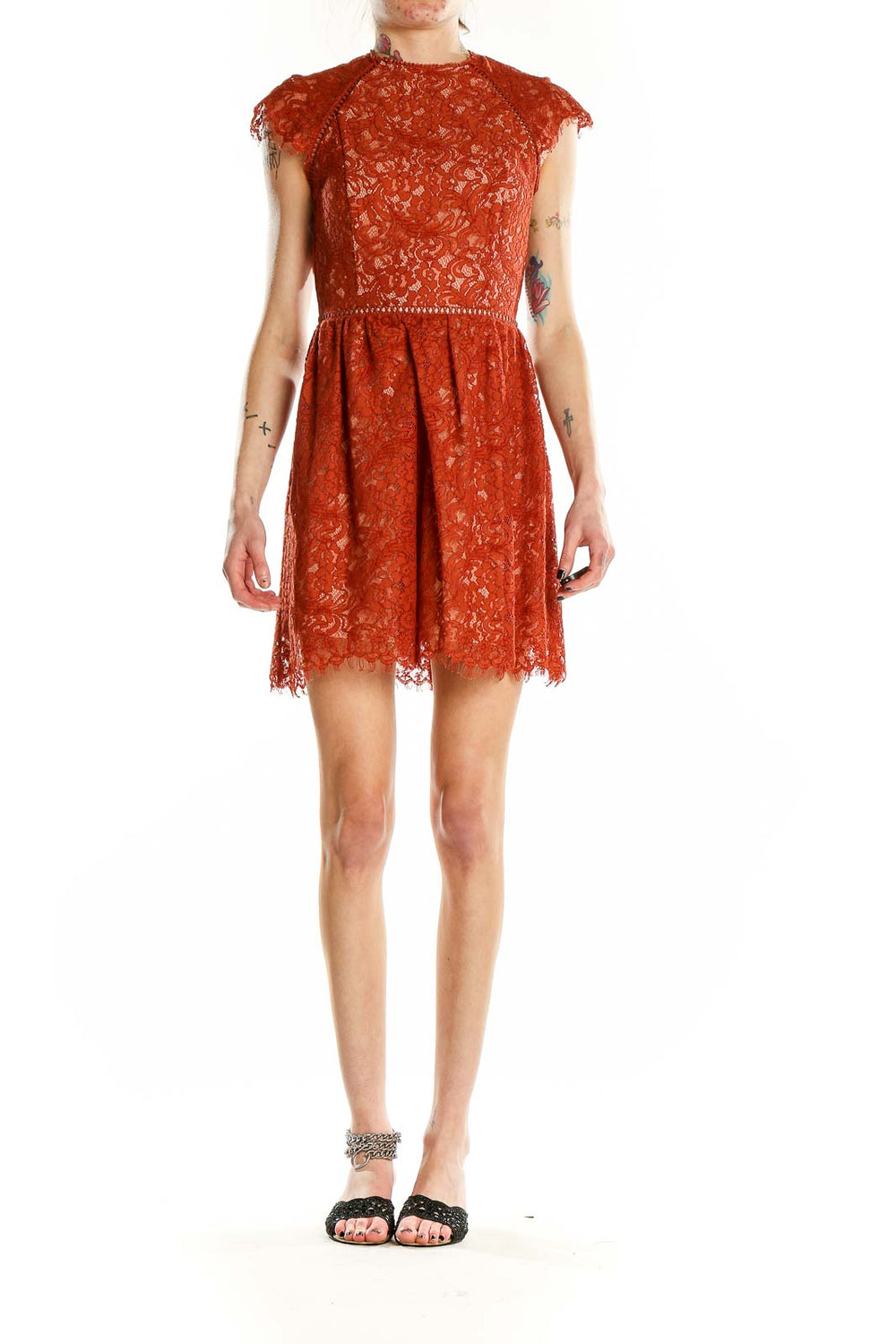 Front view of Style Stalker rust lace mini dress with cap sleeves and high neckline