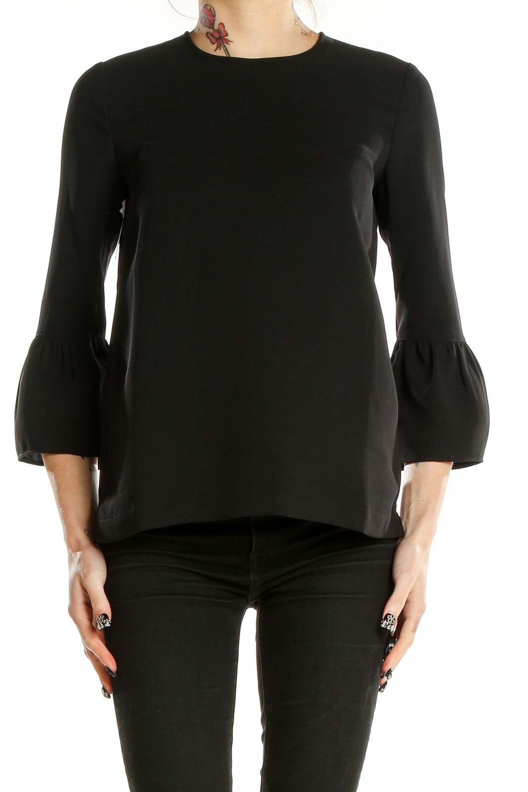 Front view of Madewell black polyester blouse with bell sleeves