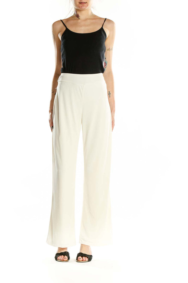 Front view of white wide-leg pants by American Glamour Badgley Mischka
