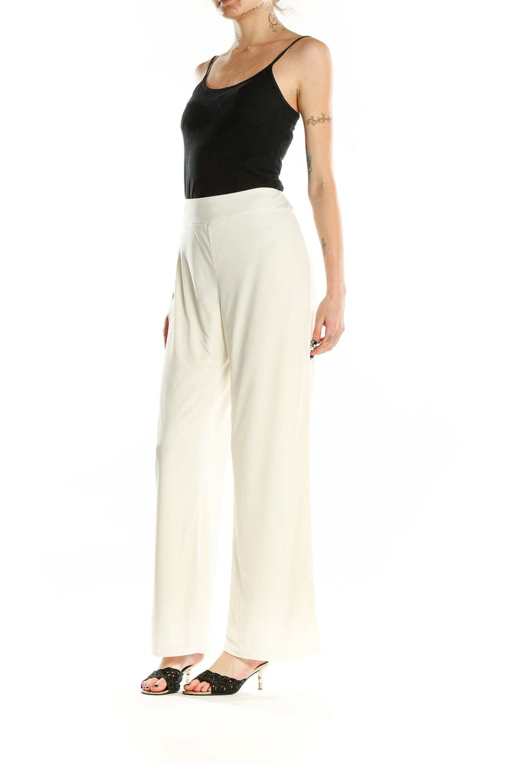 Front view of white wide-leg pants by American Glamour Badgley Mischka
