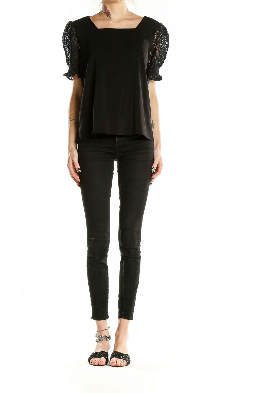 Front view of Adrianna Papell black top with lace puff sleeves and square neckline