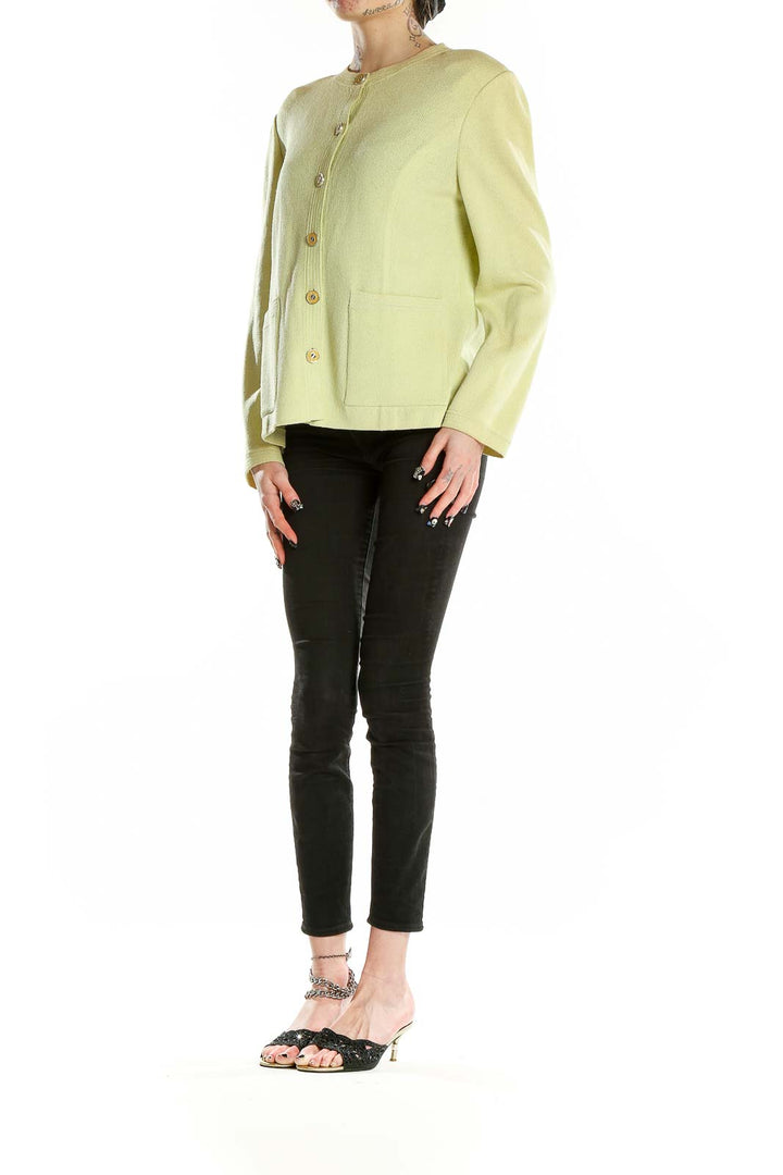 Front view of pale yellow St. John Collection button-front cardigan with patch pockets