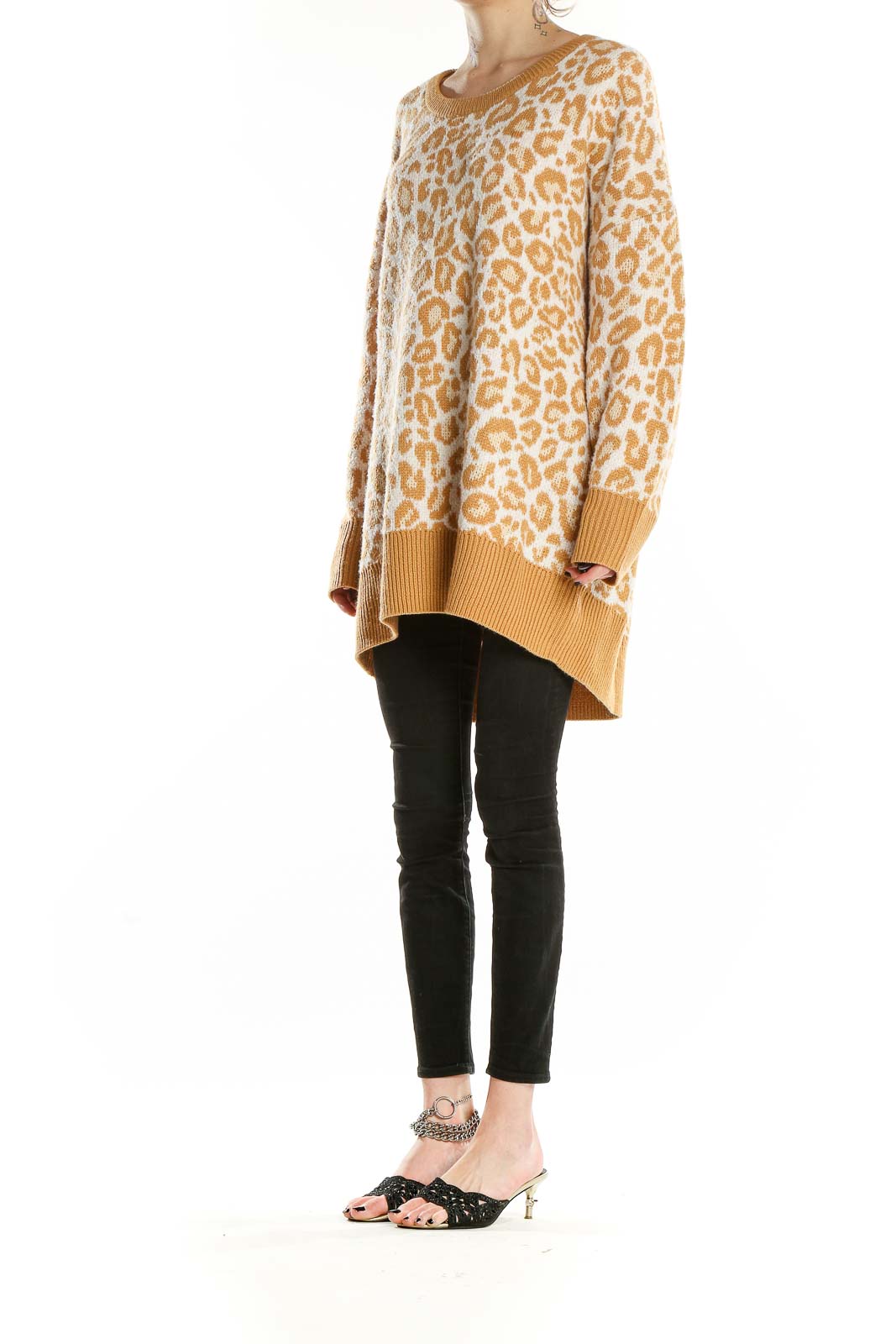 Front view of camel leopard print oversized sweater from Torrid