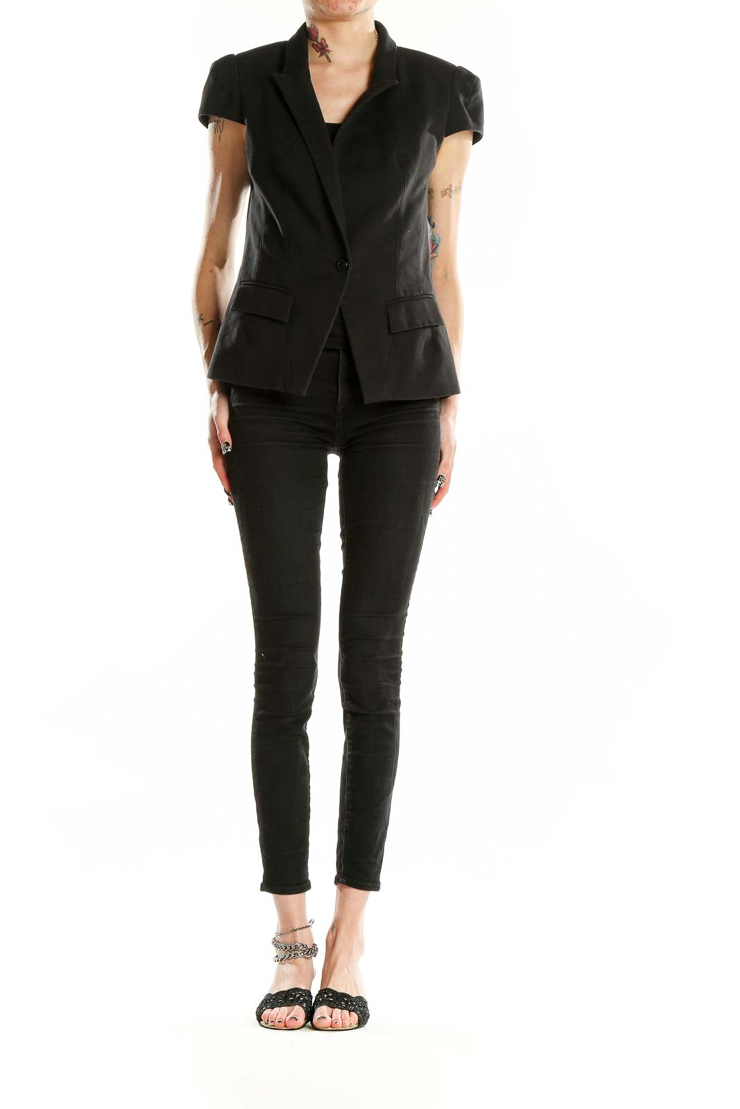 Front view of black cap sleeve blazer from Bebe