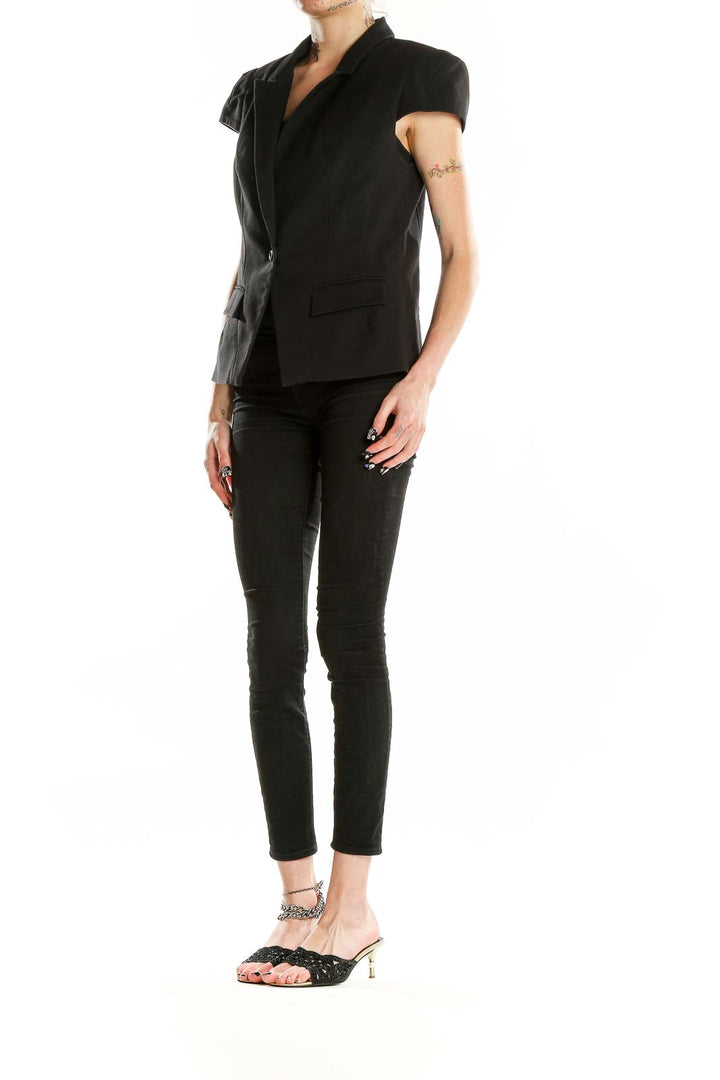 Front view of black cap sleeve blazer from Bebe