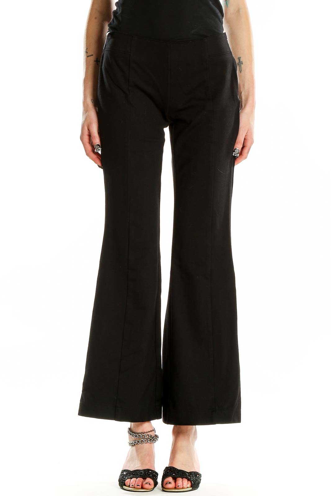 Front view of INC black wide-leg flare pants on model