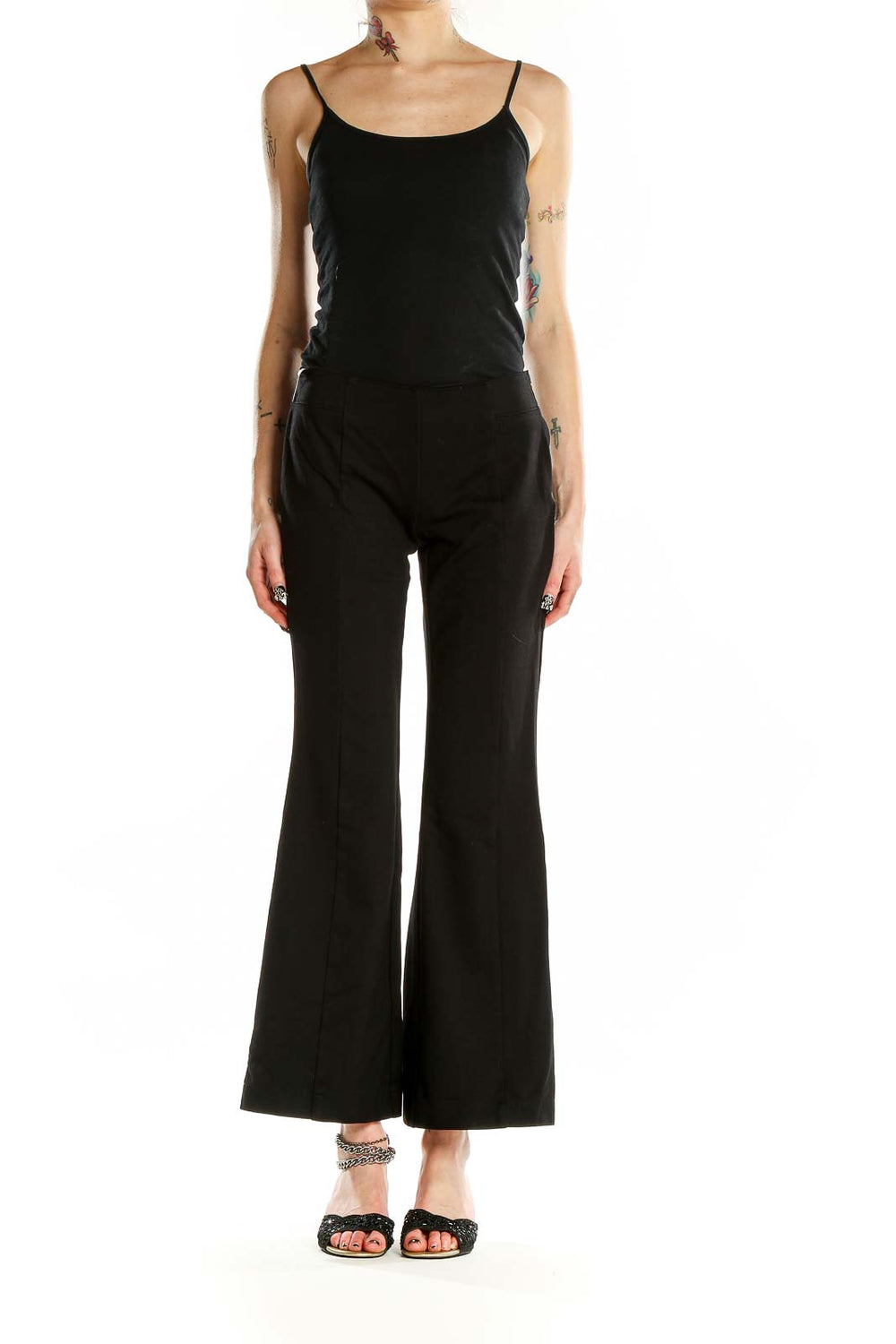 Front view of INC black wide-leg flare pants on model